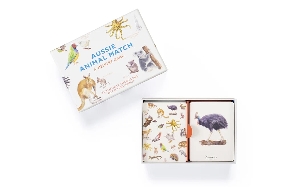 Top view image of Aussie Animal Match memory game showing open box containing game cards with box lid to the side