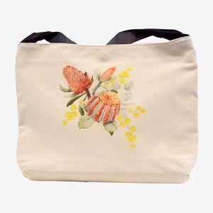 Image of front of tote bag with printed image of wildflowers