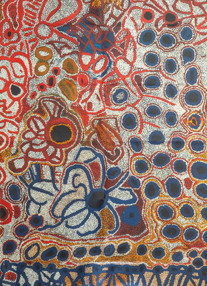 Image of Australian Made tea towel printed with 2010 artwork titled 'Yampil' by Tjawura Woods from the Spinifex Arts Project.