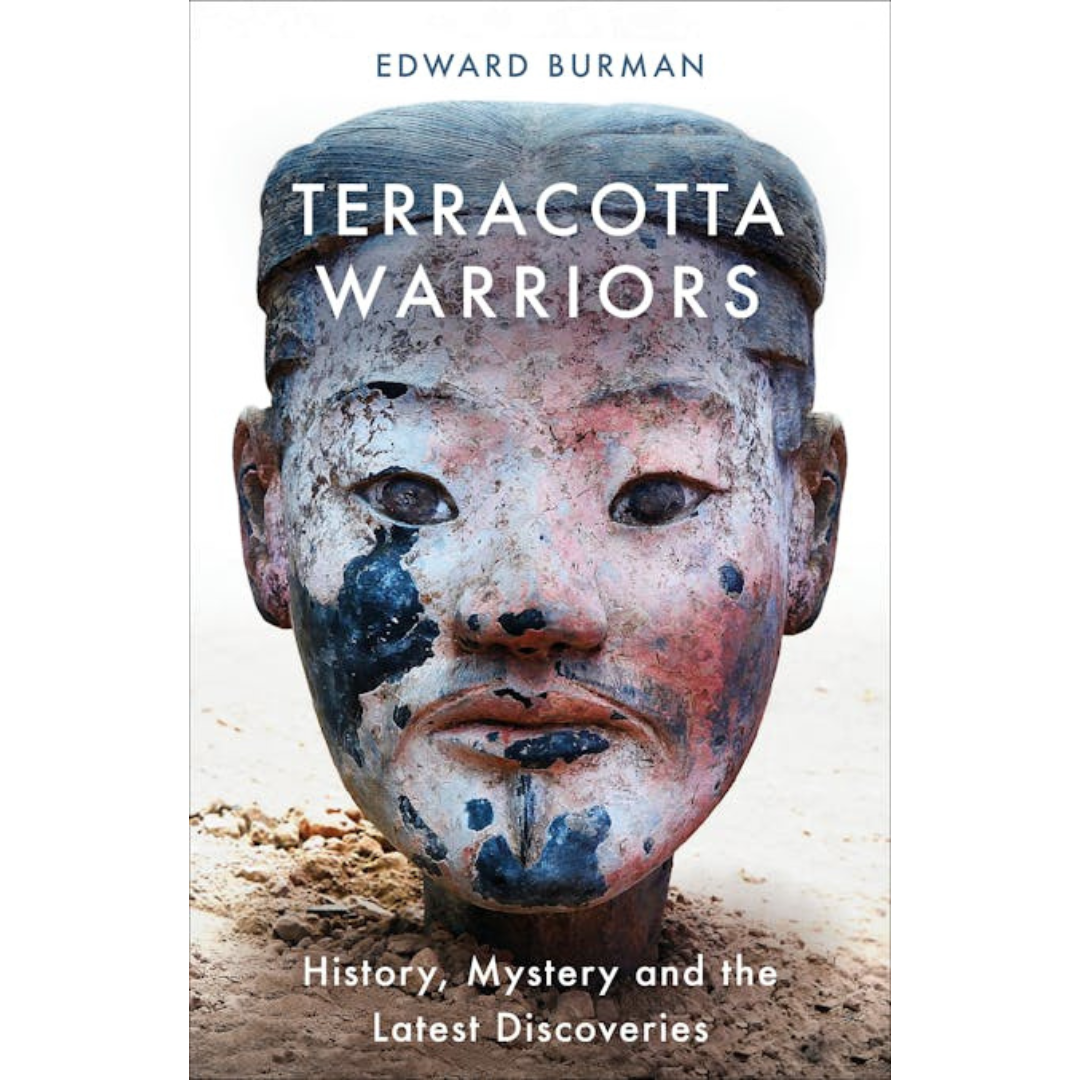 Image of front cover of book titled Terracotta Warriors: History, Mystery and the Latest Discoveries, painted terracotta warrior head in sand on white background with white writing.