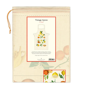 Vintage apron packaging featuring citrus fruit illustrations and product description on a beige background.