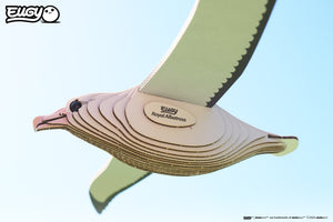 Side view image of EUGY Royal Albatross on a pale blue background.