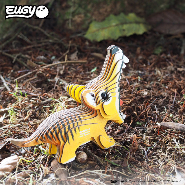 Top view image of EUGY Tasmanian Tiger on ground with dried grass.