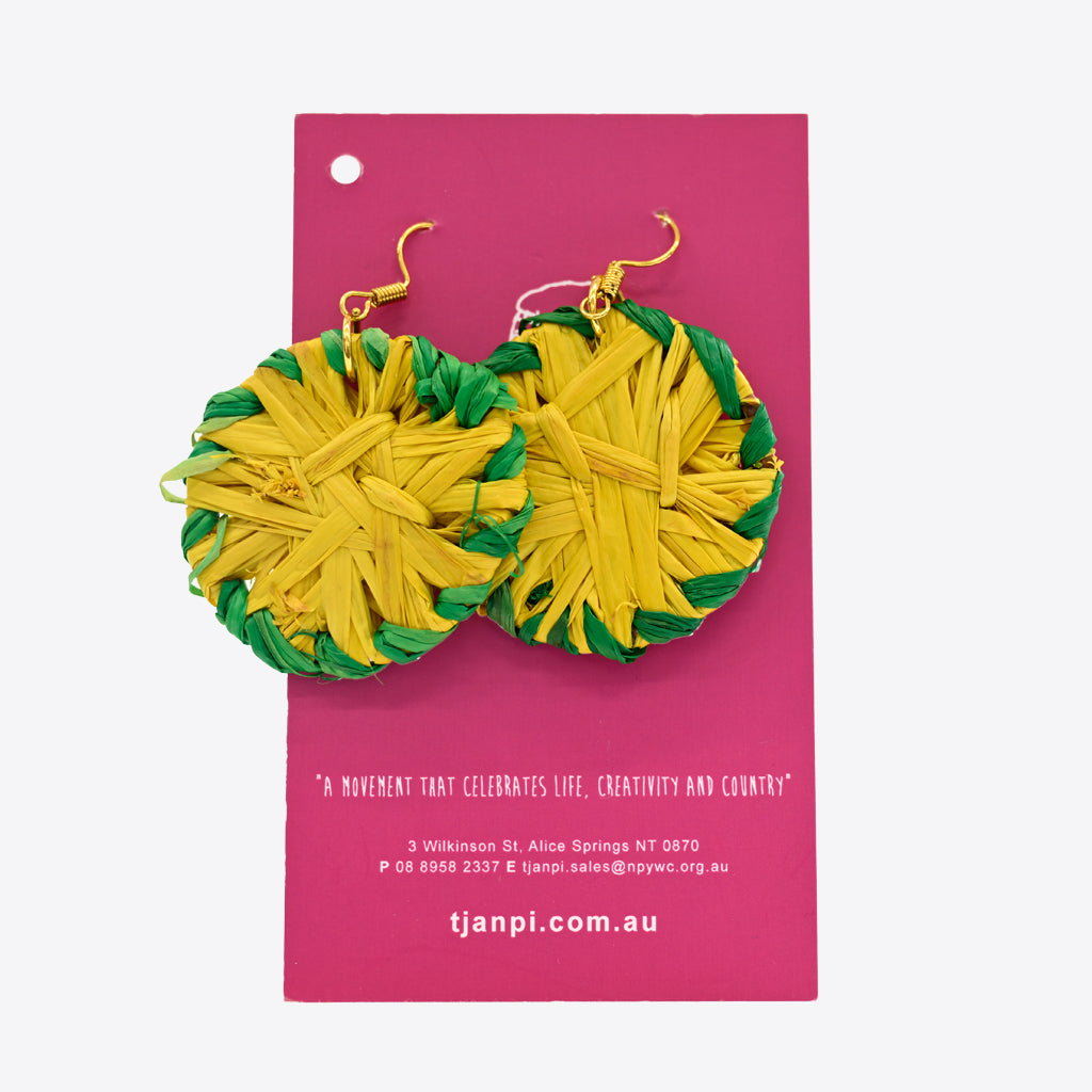 Image of yellow and green rafia earrings by Tjanpi Weavers