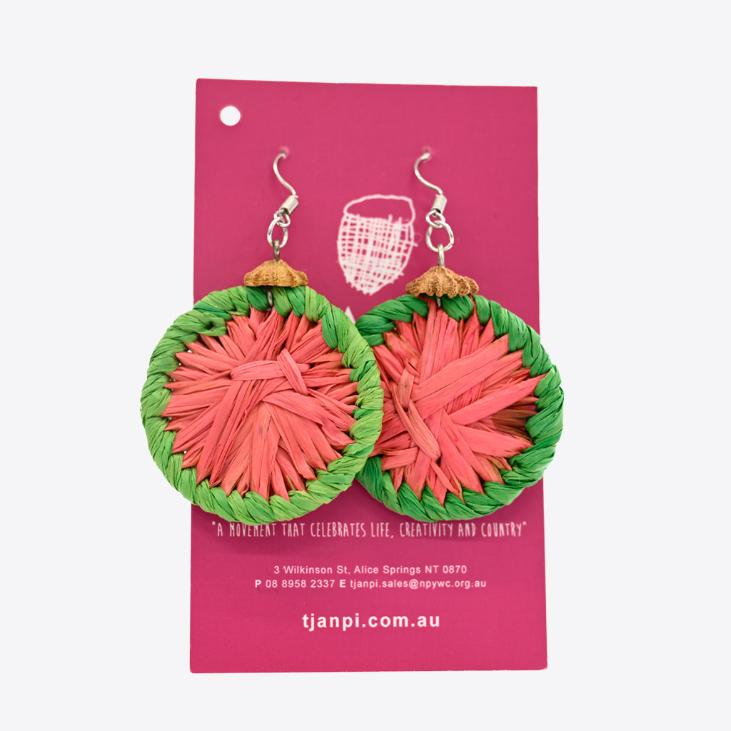 Image of pink and green rafia earrings by Tjanpi Weavers