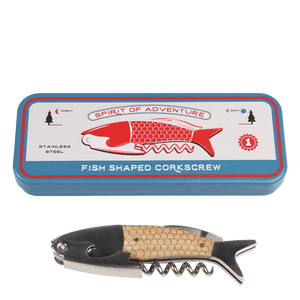 A blue rectangular tin box featuring a red fish illustration and the words "SPIRIT OF ADVENTURE" on the lid. The tin includes text such as "STAINLESS STEEL" and "FISH SHAPED CORKSCREW," along with day and night icons. Below the tin is a fish-shaped corkscrew with a metallic body, beige scale-textured handle, and a spiral corkscrew extending from the bottom.