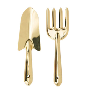 Top view image of gold garden tools