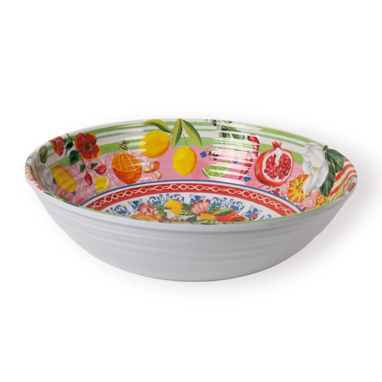 Italian summer salad bowl with vibrant fruit and floral patterns, featuring lemons, pomegranates, and flowers.