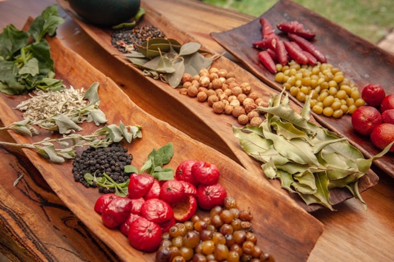 Image of a variety of bush tucker foods on wooden trays