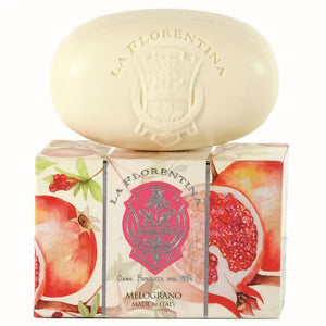 Oval La Florentina soap bar on box with pomegranate illustrations, both labelled with the brand name.