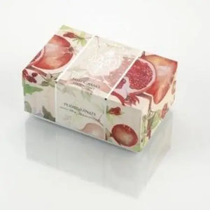Rectangular soap bar wrapped in paper with pomegranate illustrations and "Pomegranate" text on white background.