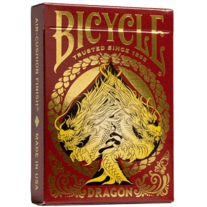 Image of Bicycle Dragon playing cards deck in a red and gold box featuring ornate dragon artwork, with "Bicycle" and "Dragon" prominently displayed in stylized lettering and "Trusted Since 1885" written below the brand name.