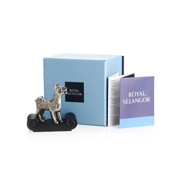 Image of Chinese Zodiac Dog Figurine by Royal Selangor, showing silver dog figurine on black stand and blue packaging on white background.