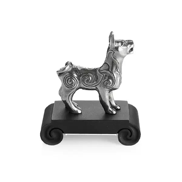 Side view image of Chinese Zodiac Dog Figurine by Royal Selangor, showing silver dog figurine on black stand on white background.