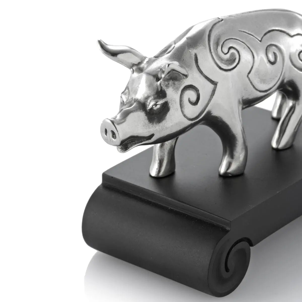 Close up image of Chinese Zodiac Boar Figurine by Royal Selangor, showing silver pig figurine on black stand on white background.