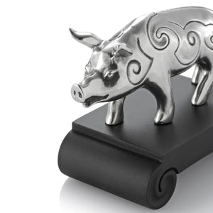Close up image of Chinese Zodiac Boar Figurine by Royal Selangor, showing silver pig figurine on black stand on white background.