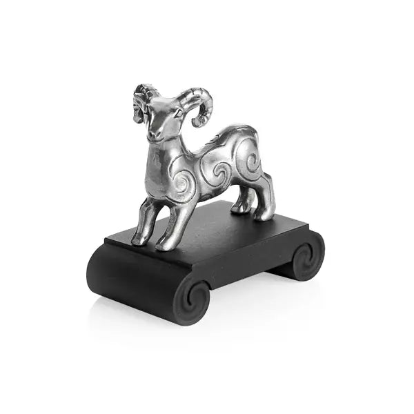 Image of Chinese Zodiac Ram Figurine by Royal Selangor, showing silver ram figurine on black stand on white background.