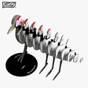 Image of EUGY Crane showing expanded 3D carboard model of a red-crowned crane with white body, black neck and legs, and a red patch on the head on white background.