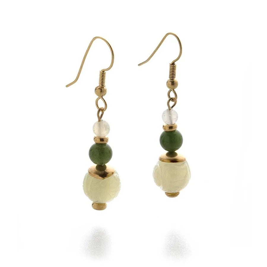 Image of pair of gold hanging earrings with three jade beads on white background. 