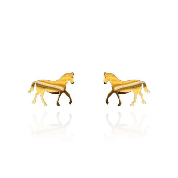 Image of a pair of gold-tone stud earrings in the shape of walking horses, featuring a smooth, reflective finish with slight shading for depth. Displayed on a white background with a faint mirrored reflection beneath each earring.