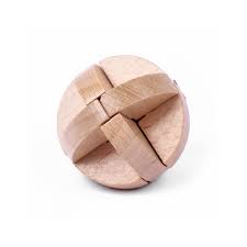 Image of unboxed Mesopotamian Wheel Puzzle from the Lost & Found collection, showing a round, interlocking wooden brain teaser composed of curved and angled wooden pieces against a plain white background.