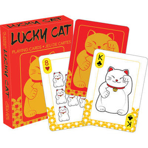 A red and yellow box of 'Lucky Cat' playing cards featuring maneki-neko (beckoning cat) illustrations. Two cards are displayed in front: the 8 of hearts with eight small white lucky cats, and the King of spades with a large white lucky cat wearing a bell collar, all set against a white background.