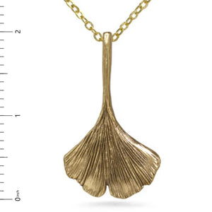Image of ginko leaf shaped pendant in antique gold on gold chain, on white background.