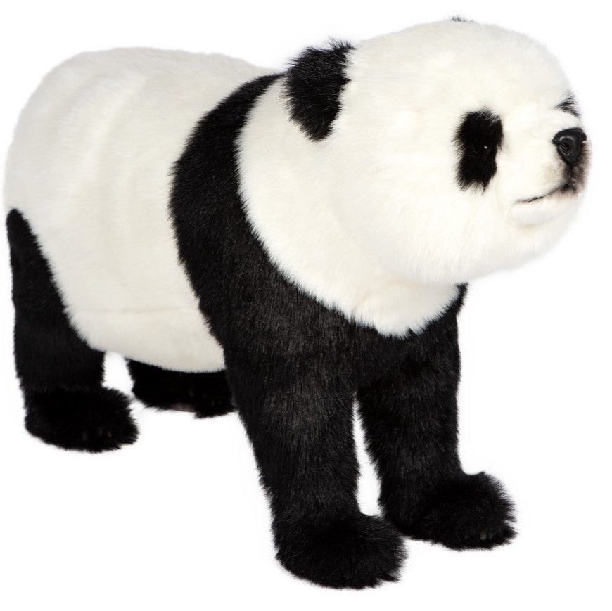Image of a realistic plush panda seat with black and white fur, standing on all fours and facing slightly to the right, set against a plain white background.
