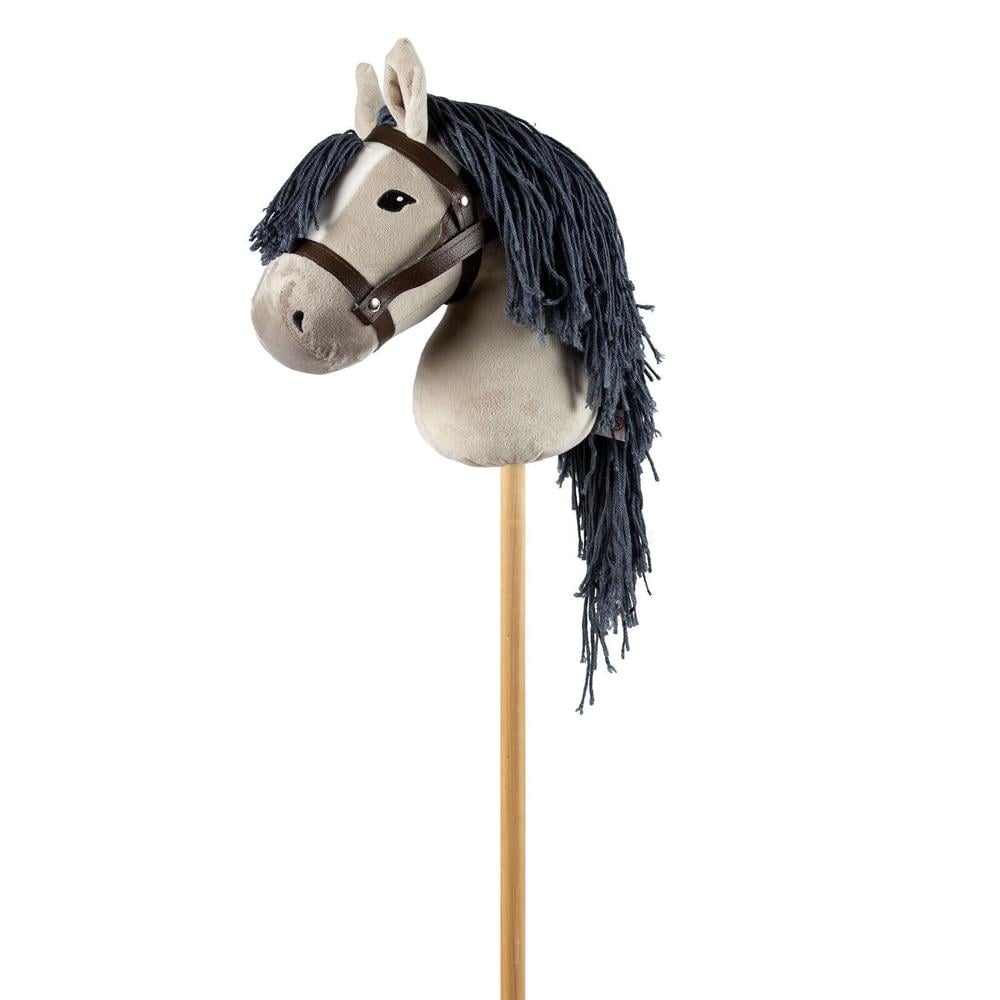 Image of grey hobby horse, showing grey plush horse head with dark grey mane and dark brown bridle, attached to pine stick, on white background.