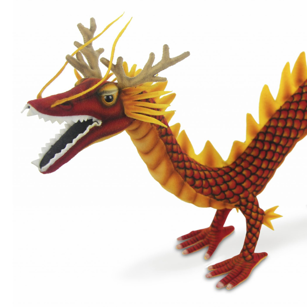 Close up image of Red Chinese Dragon Plush Toy, showing standing red and orange Chinese dragon with yellow spine.