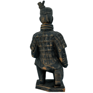 Statue of a warrior in armor on a white background