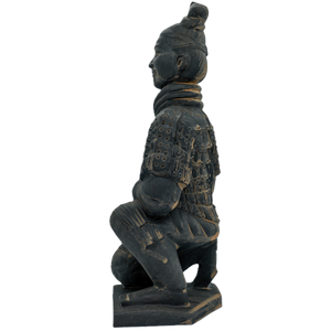 Statue of a warrior in traditional armor on a white background
