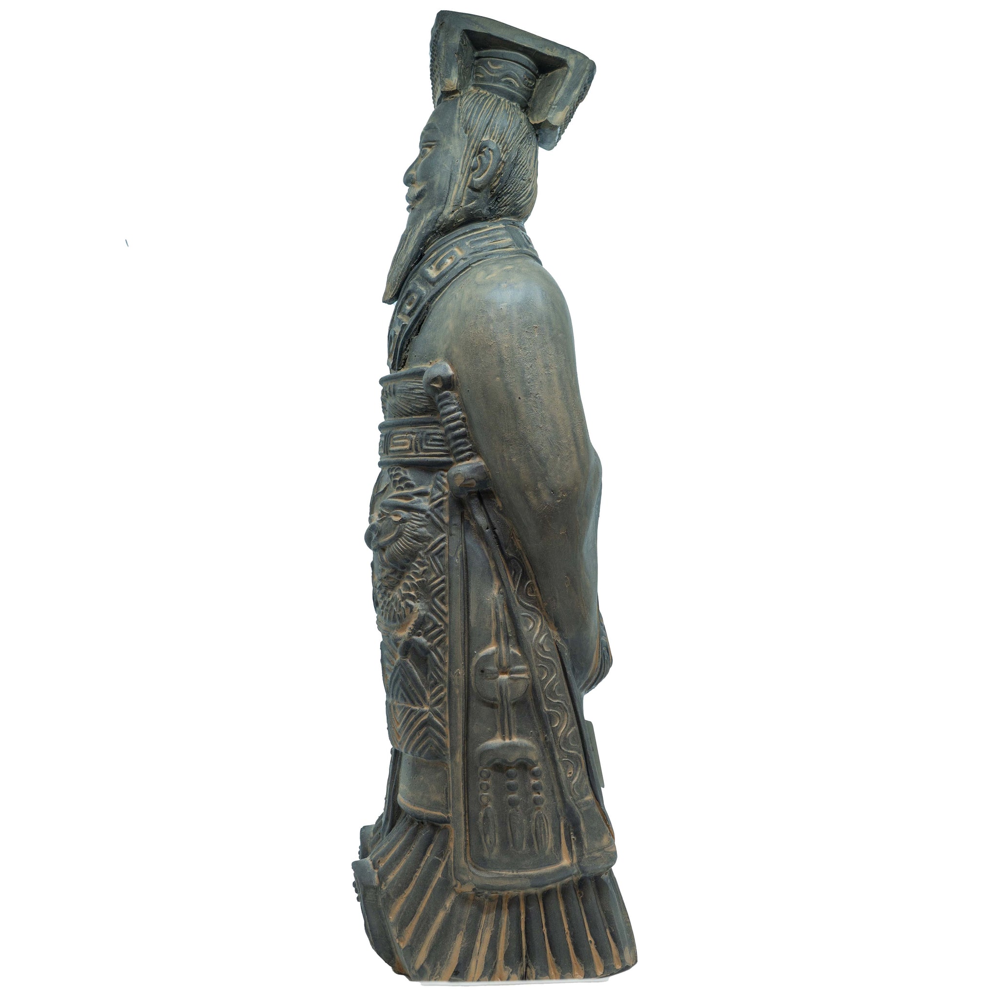 Side view of a 40cm stone statue of a terracotta warrior emperor showing the profile of the figure’s face, tall headdress, long carved robes with dragon and geometric motifs, and hands folded behind the back.