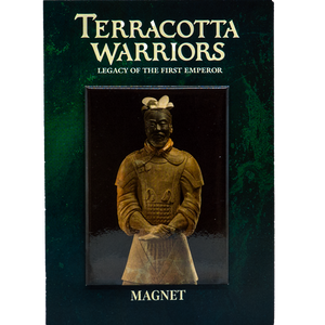 A magnet featuring a Terracotta Warrior figurine is displayed on a dark green card. The card has the text "TERRACOTTA WARRIORS" at the top, followed by "LEGACY OF THE FIRST EMPEROR" in smaller letters underneath. At the bottom of the card, it says "MAGNET". The figurine is dressed in traditional armor with intricate details and stands with hands clasped in front.