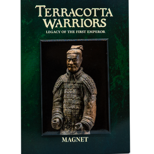 A souvenir magnet featuring a 3D miniature replica of a Terracotta Warrior, mounted on a dark green card that reads "TERRACOTTA WARRIORS – Legacy of the First Emperor" at the top and "MAGNET" at the bottom. The warrior is depicted in detailed armor with a topknot hairstyle, resembling the famous ancient Chinese Terracotta Army statues.