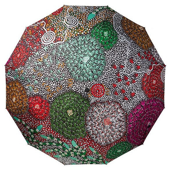 Top view image of expanded umbrella with aboriginal print by Coral Hayes