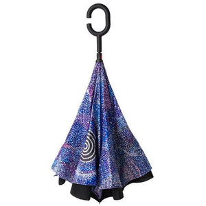 Image of Invert Umbrella with artwork by Alma Granites showing closed umbrella