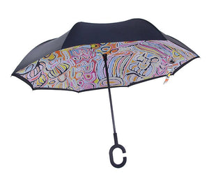 Image of the Invert Umbrella with artwork by Judy Watson showing unfolded umbrella