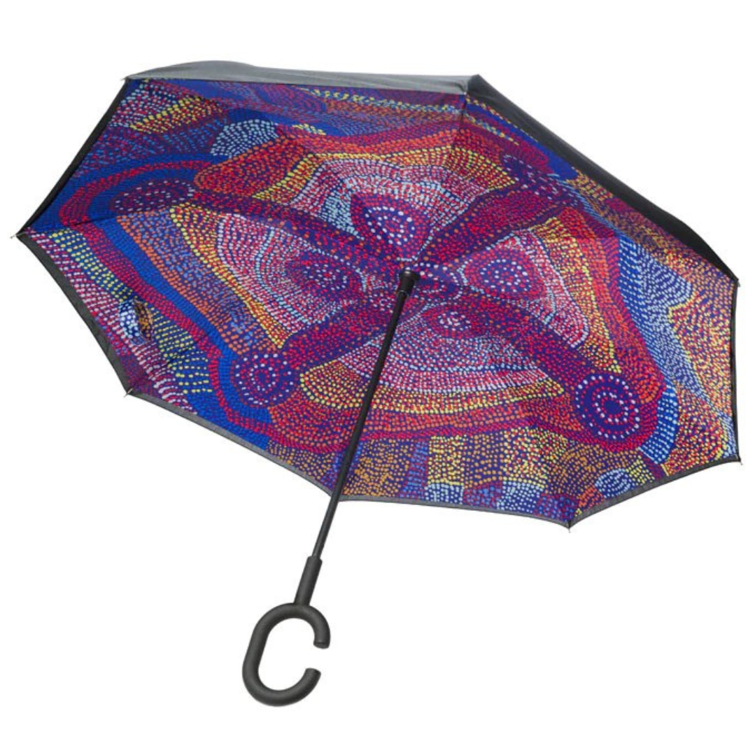 Image of the Invert Umbrella with artwork by Megan Kantamarra, showing interior of open umbrella