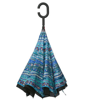 Image of Invert Umbrella with artwork by Murdie Morris showing closed umbrella