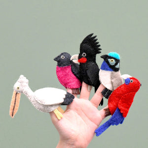 Image of Australian Bird Finger Puppets on hand on green background